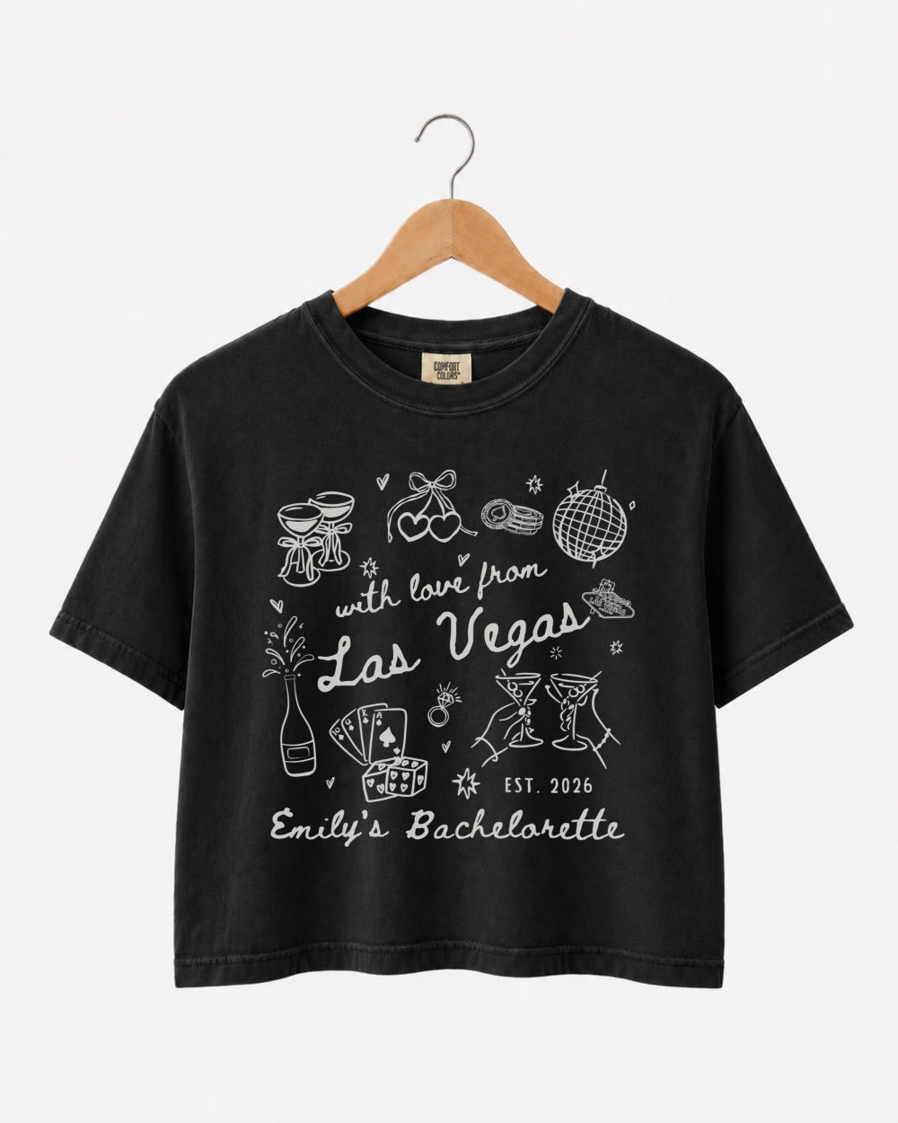 Matching crop tops for the bachelorette crew with vintage line-art Las Vegas theme. Personalized with bride name, year, and destination city for the whole party.