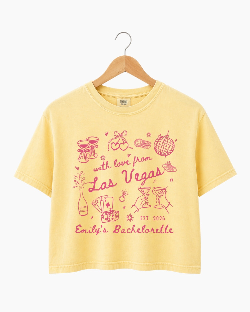 Personalized Las Vegas bachelorette crop top with vintage line-art script, customizable with bride name, year, and destination city. Matching set for the whole crew.
