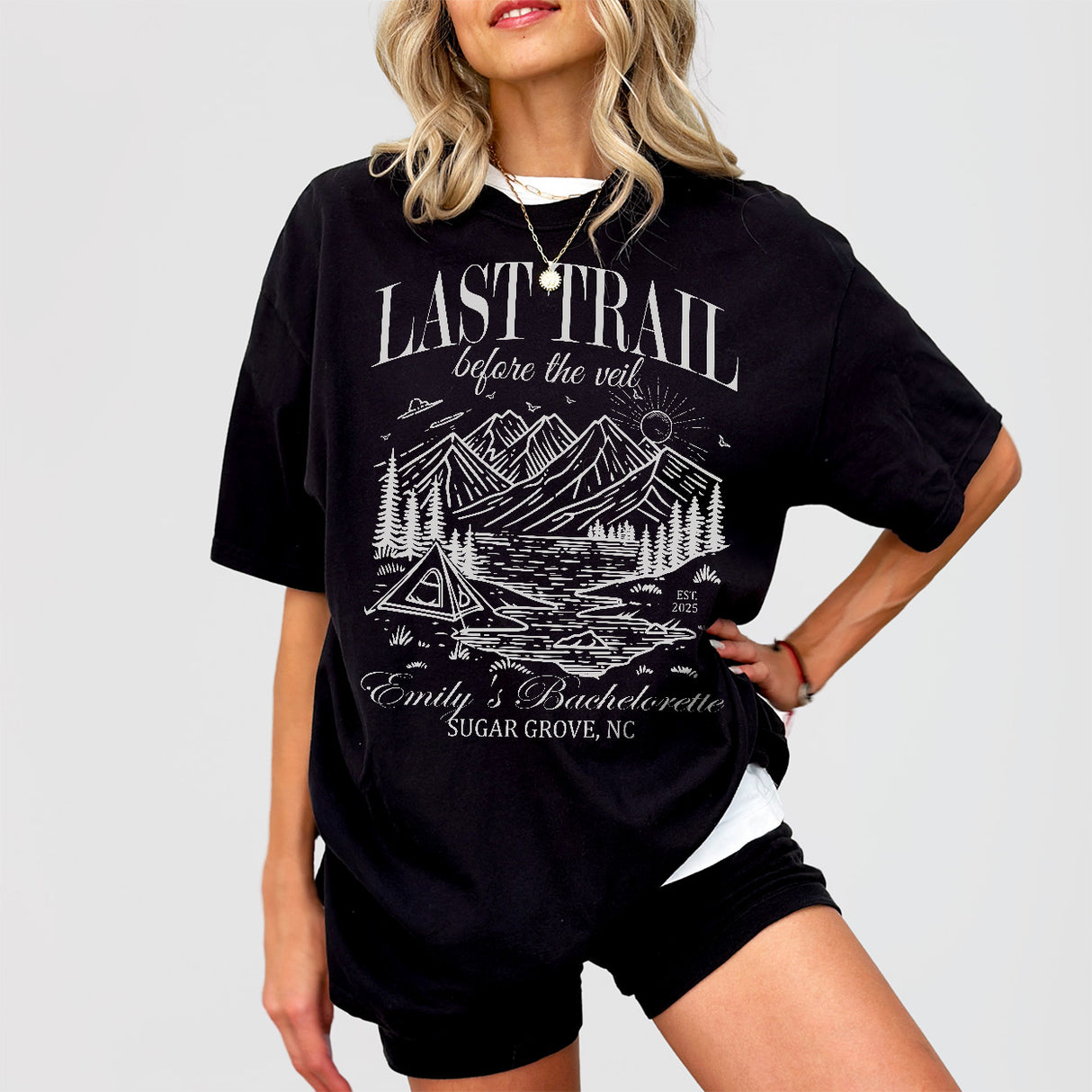 Black cotton shirt perfect for a camping bachelorette party with "Last Trail Before the Veil" design for the bride-to-be