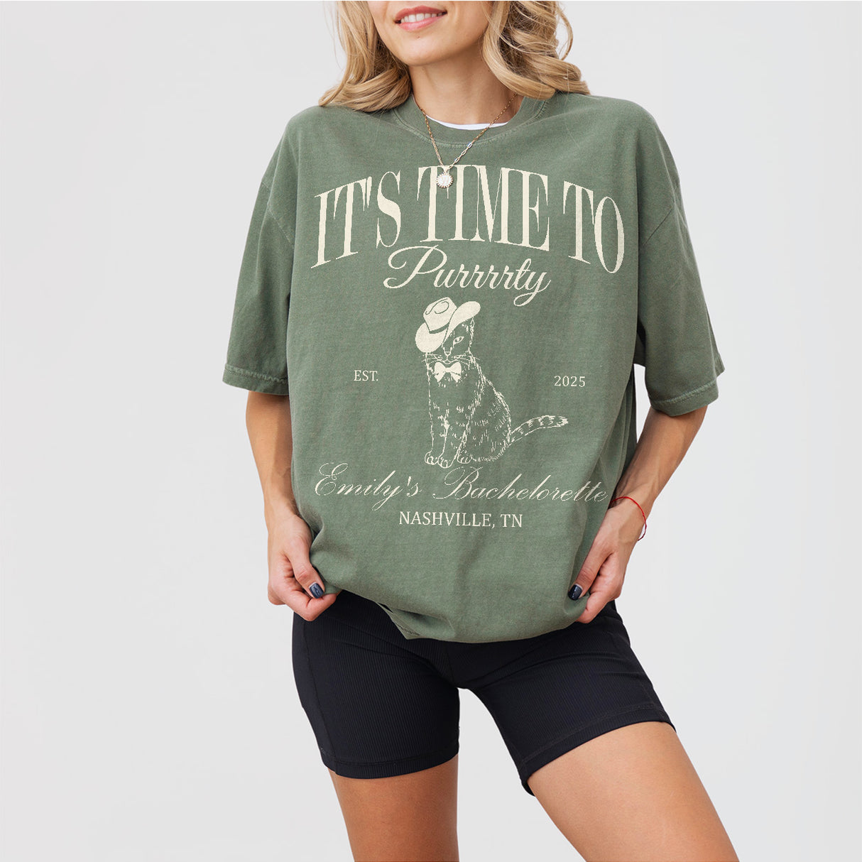 Moss green cotton bachelorette party shirt with playful cat and "Getting Meowied" text design for the bride-to-be or bridal party