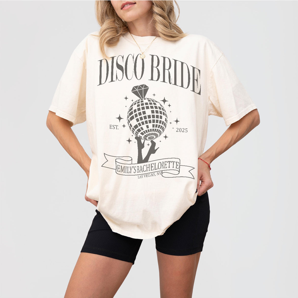 Ivory cotton bachelorette shirt with a retro disco and dancing queen design for the bride's last fling before the ring