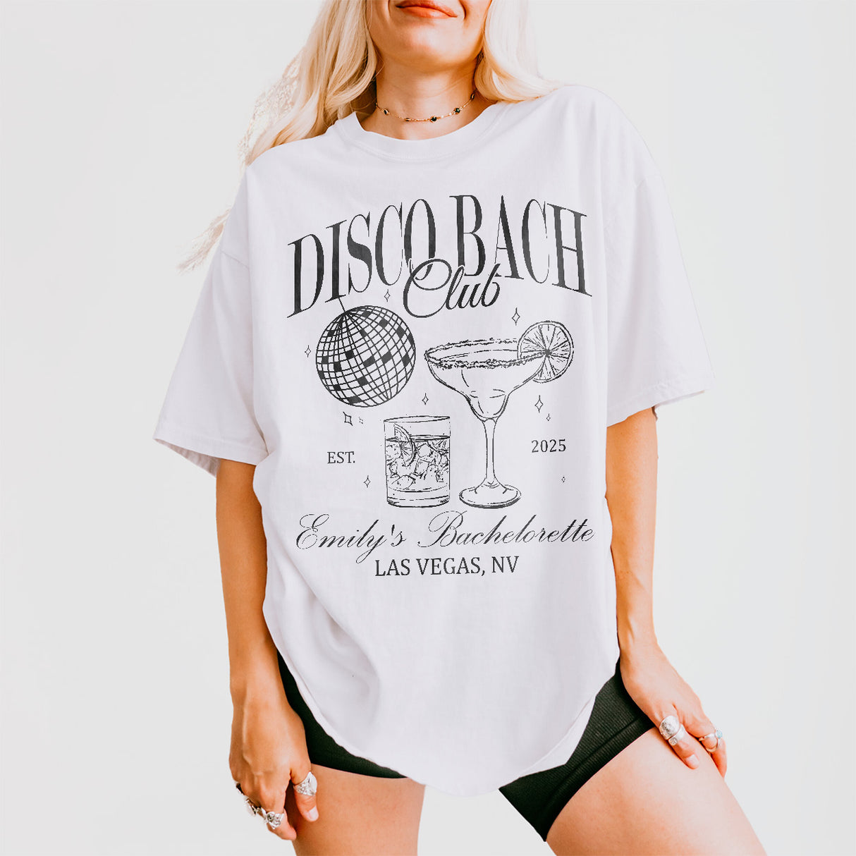Personalized white cotton bachelorette shirt with disco-themed design for the bride-to-be to wear at her last fling before the ring party
