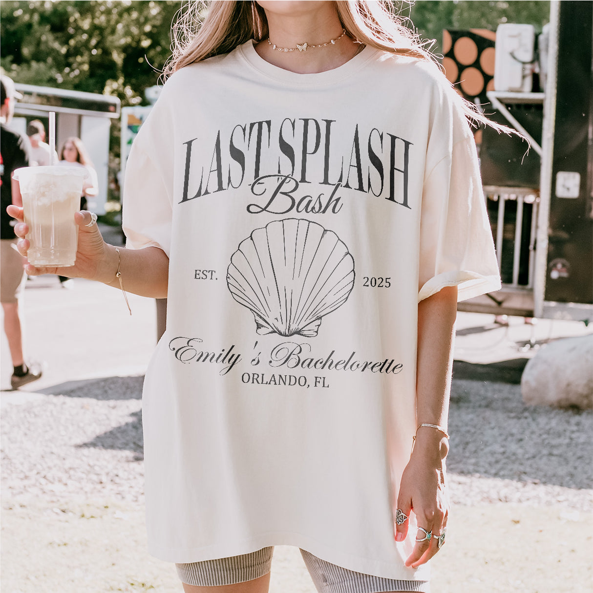 Woman wearing a personalized Last Splash bachelorette shirt for a beach or pool-side vacation and girls trip celebration