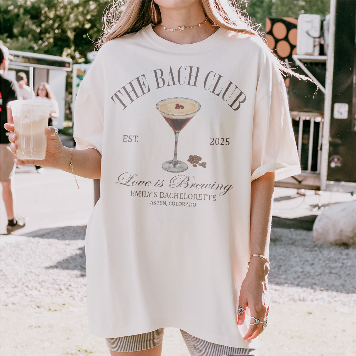 Cozy espresso martini themed bachelorette party shirt worn by bridesmaids celebrating the bride-to-be's last fling before the ring