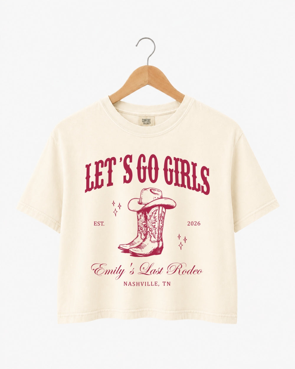 Bachelorette rodeo weekend crop top for the bride and her crew, vintage western script with cowboy boot art. Personalized with bride name, year, and city for any last-rodeo destination.