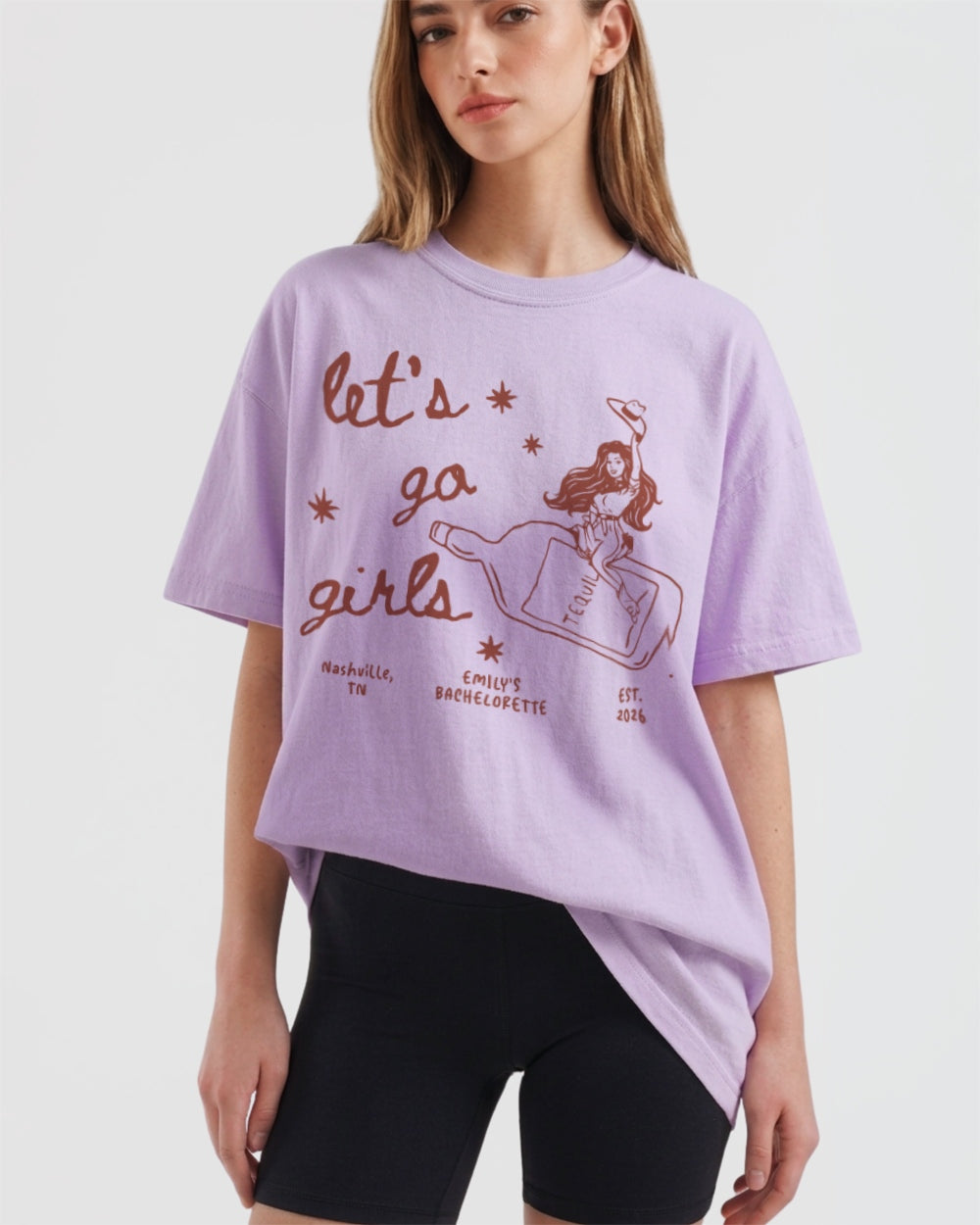 Matching shirts for a girls night out with vintage cowgirl line-art and Let's Go Girls script. Casual tee for country concerts, bachelorette parties, or a spontaneous weekend with the crew.