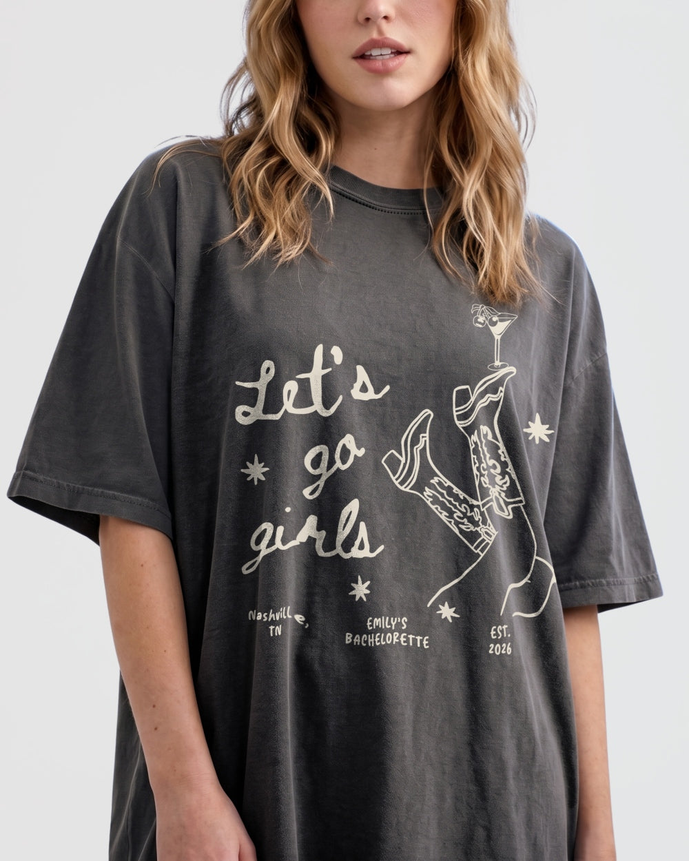Girls night out tee with vintage line-art boots and martini graphics, script lettering for the whole crew. Perfect for bachelorette parties, girls trips, or a night on the town.