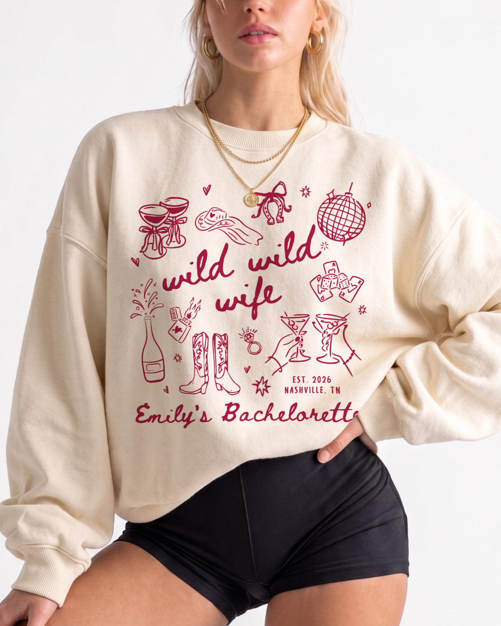Bachelorette weekend sweatshirt with Wild Wild Wife doodle theme for the bride and her crew. Personalized with bride name, date, and destination city for the full matching set.