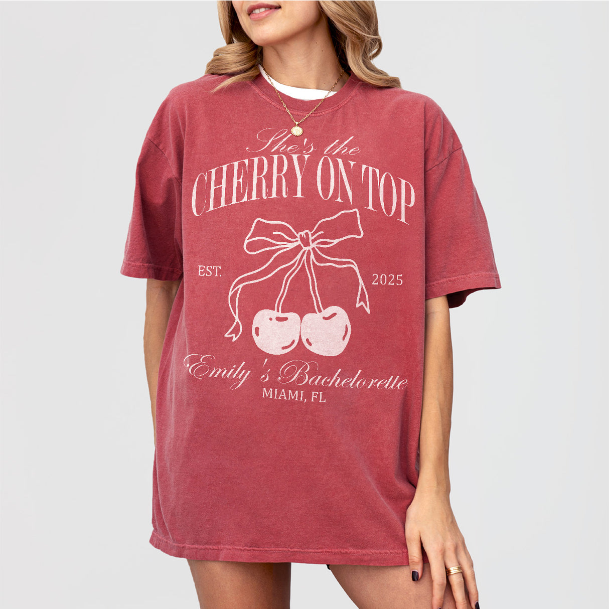Cotton crimson bachelorette party shirt with cherry graphic, ideal for celebrating the bride-to-be on her bridal shower or bachelorette weekend