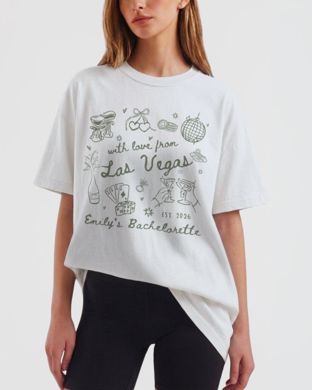 Personalized Las Vegas bachelorette t-shirt with bride name, year, and destination in playful doodle script. Custom matching tee for the bride tribe heading to Vegas.