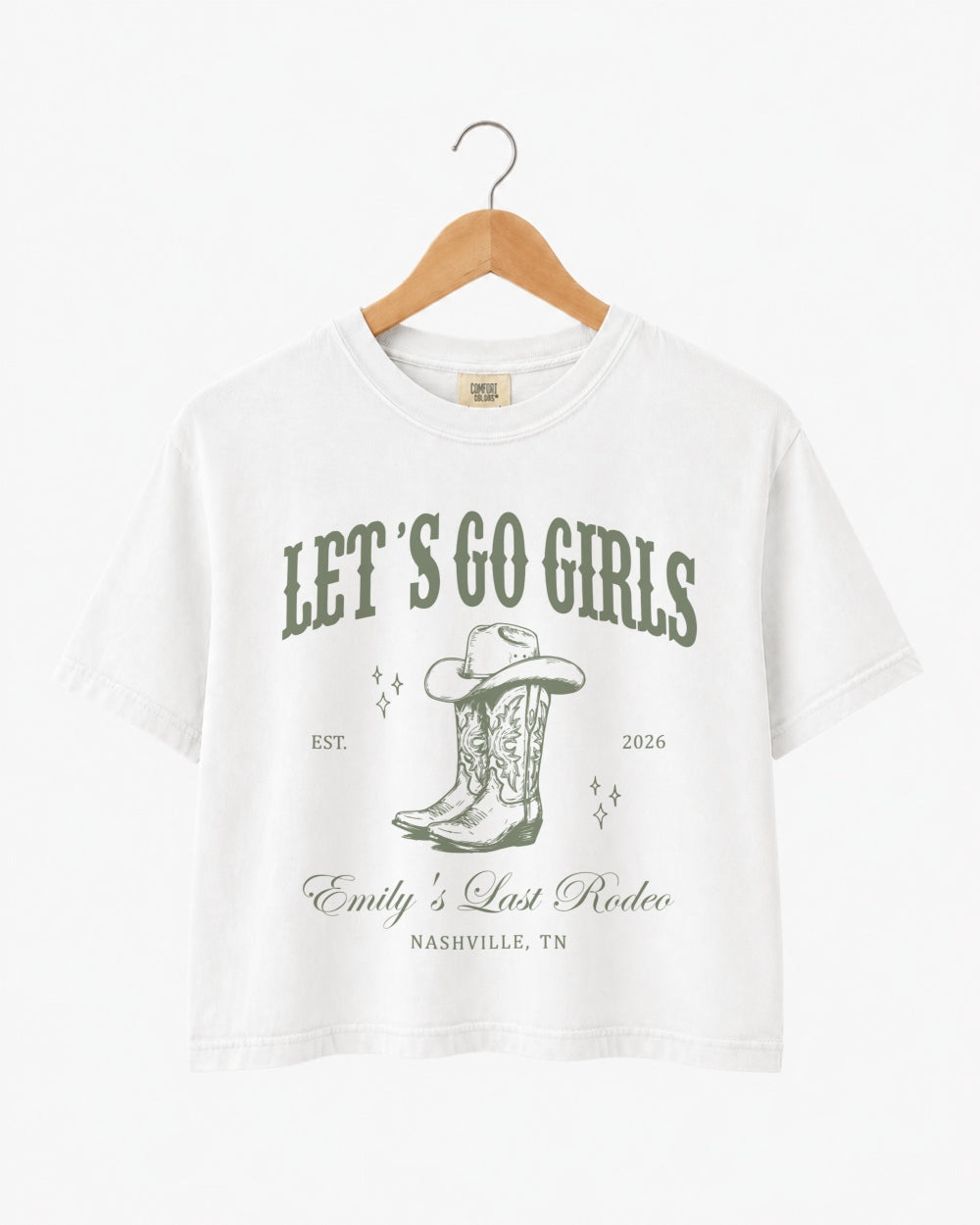 Bachelorette rodeo weekend crop top with vintage western script and cowboy boot art for the Nashville-bound bride crew. Bride name, year, city, and party title customizable for the full squad.