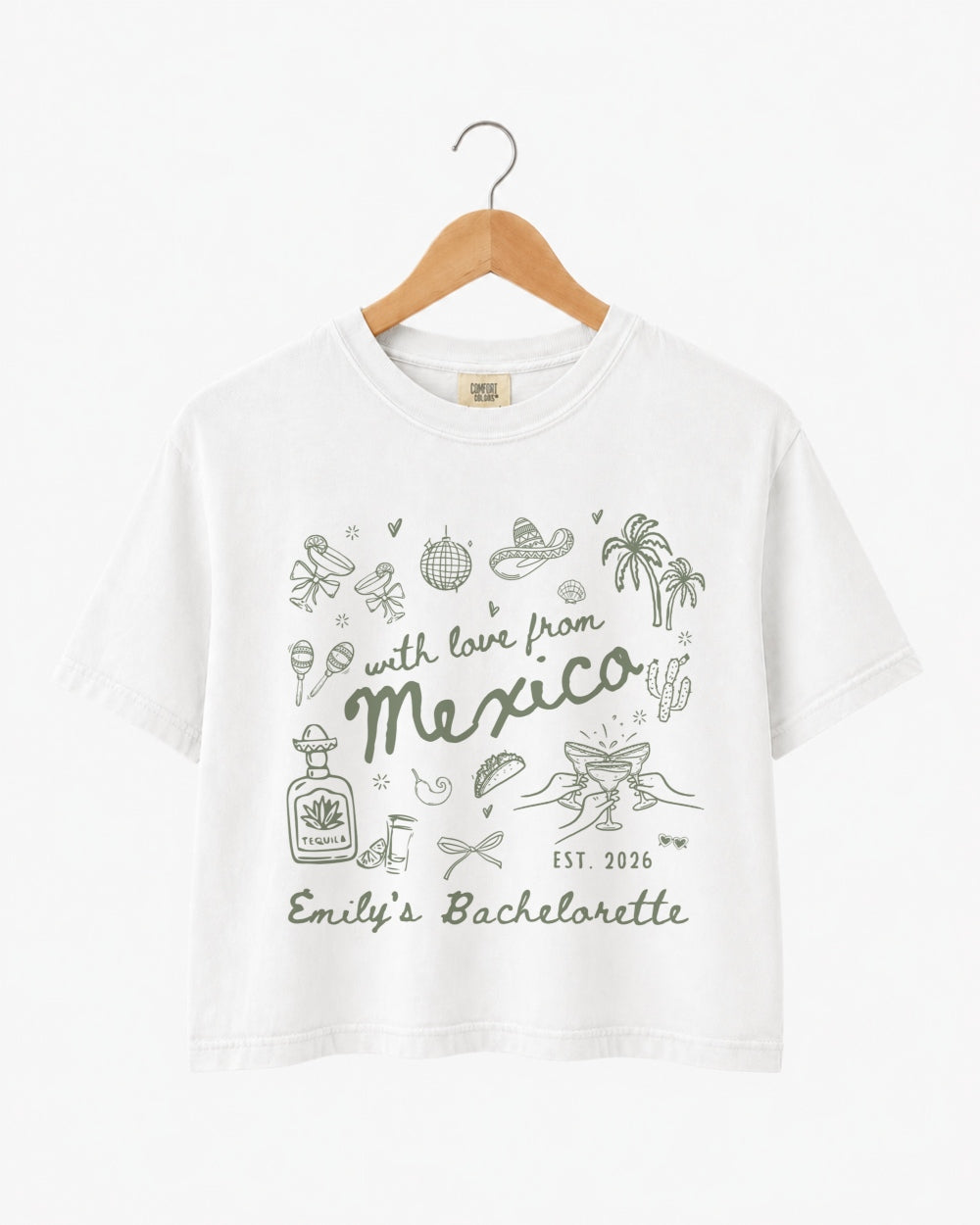 Mexico bachelorette weekend crop top with playful hand-drawn script art for the bride and her crew. Personalized with bride name, destination, and EST year for the full trip.