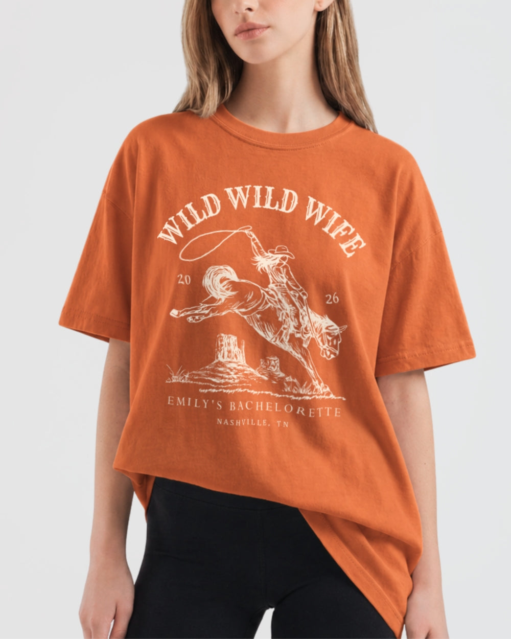 Gift idea for the bride-to-be: Wild Wild Wife bachelorette tee with vintage western doodle art. Personalized with bride name, destination city, and weekend date for the whole crew.