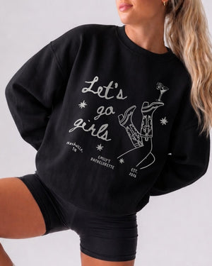 Girls night out crew sweatshirt with minimalist line-art boots and martini graphics and hand-drawn script lettering. Cozy matching option for the whole squad heading out together.