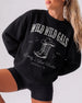 Bride and bridesmaids matching country western bachelorette sweatshirts with bold varsity-style text and cowboy boots graphic. Personalized with bride name, year, and destination city for the whole crew.