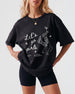 Girls night out crew tee with vintage line-art boots and martinis, Let's Go Girls script lettering. Matching bachelorette or hens night shirts for the whole squad.