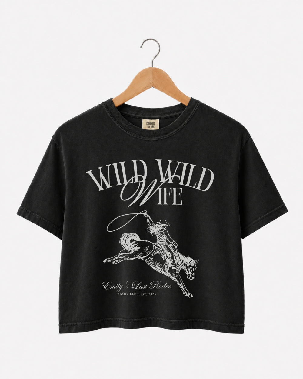 Matching crop tops for the bride's last rodeo bachelorette crew, vintage western script with bride name, date, and city customizable for Nashville or any destination weekend.