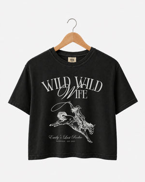 Matching crop tops for the bride's last rodeo bachelorette crew, vintage western script with bride name, date, and city customizable for Nashville or any destination weekend.