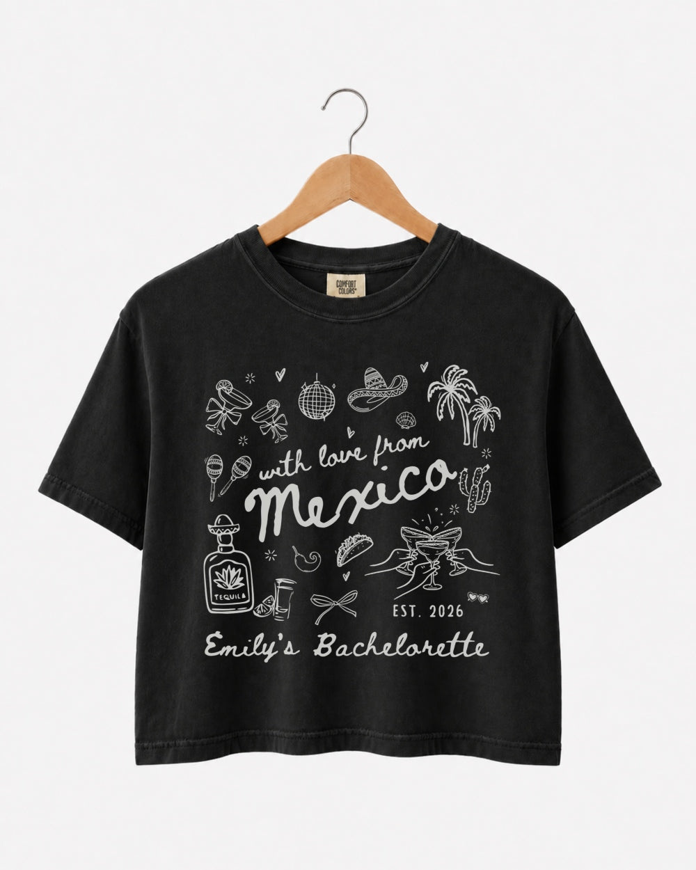 Matching crop tops for the bachelorette crew with a Mexico destination theme and playful hand-drawn script art. Personalized with bride name, wedding year, and trip destination.