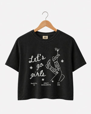 Matching crop tops for girls night out with vintage boots and martini illustration. Let's Go Girls script tee for bachelorette parties, girls trips, and birthday nights out.