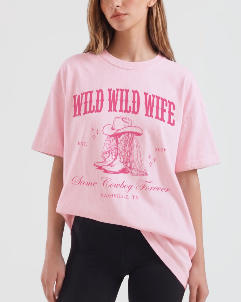 Vintage western bachelorette t-shirt with ornate cowboy boot illustration and serif script lettering. Wild west country bride style, personalized with name, year, and hometown for the full crew.