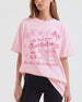 Vintage script bachelorette tee with decorative doodle icons and a Charleston destination theme. Personalized with bride name, city, and est. year for the whole crew.