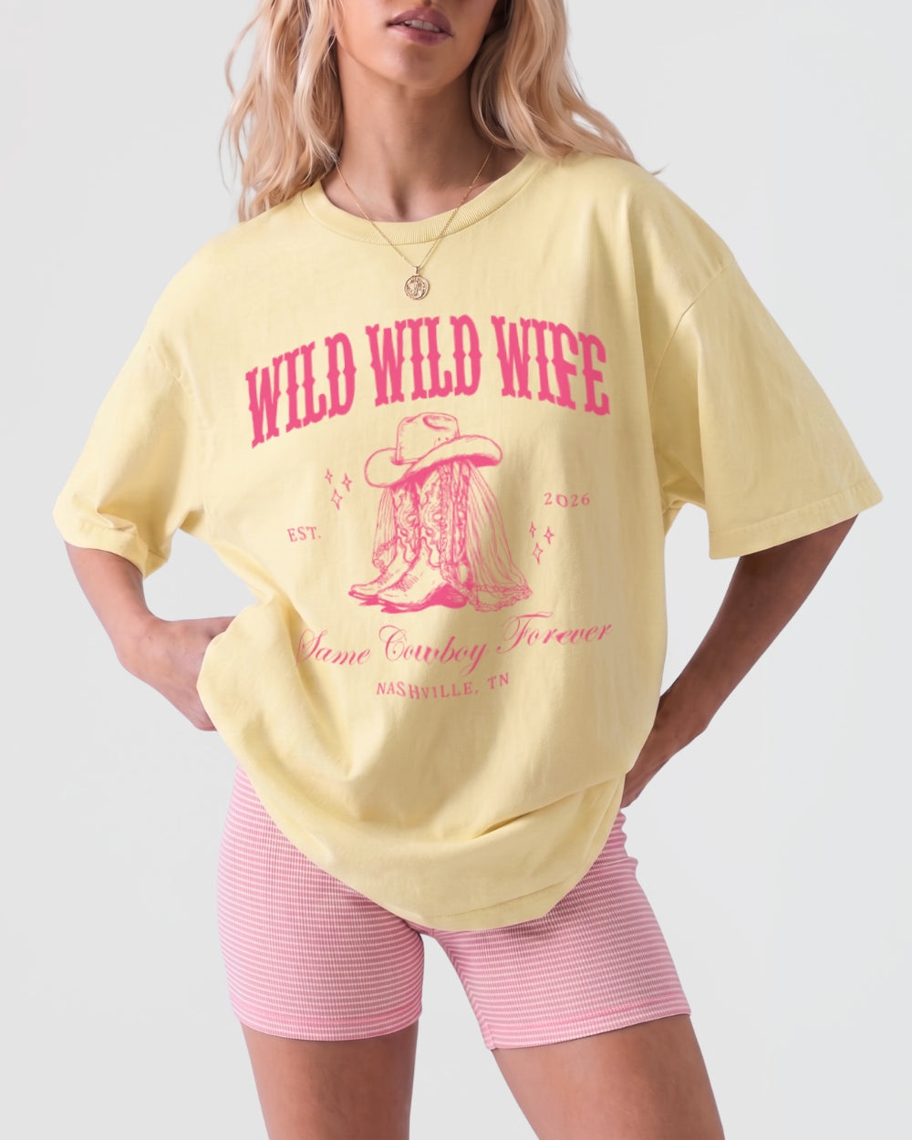 Matching shirts for the wild west bride and her crew, country bachelorette tee with vintage cowboy boot illustration and ornate western lettering. Personalized with bride name, year, and city.