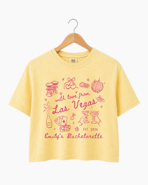 Personalized Las Vegas bachelorette crop top with vintage line-art script, customizable with bride name, year, and destination city. Matching set for the whole crew.