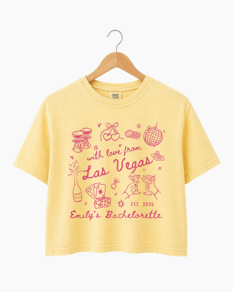 Personalized Las Vegas bachelorette crop top with vintage line-art script, customizable with bride name, year, and destination city. Matching set for the whole crew.