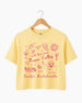 Personalized Napa Valley bachelorette crop top with bride name, year, and destination customizable. Whimsical line-art doodle design with script typography for the full bridal crew.