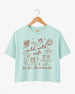 Bride and bridesmaids matching boxy crop tees for a Wild Wild Wife bachelorette weekend. Personalized with bride name, EST year, and destination city for the full crew.