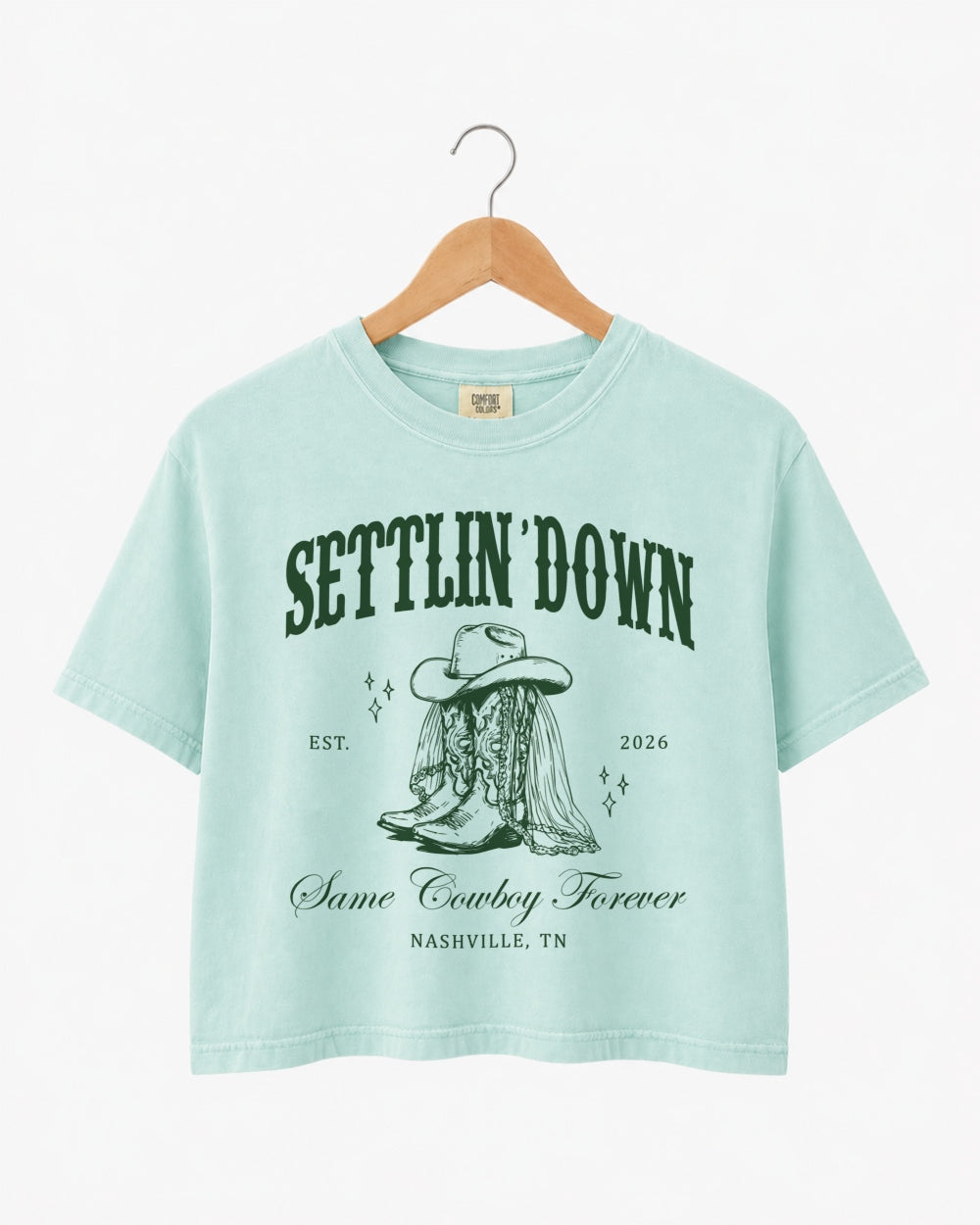 Gift idea for the bride heading into her last rodeo: bachelorette crop top with vintage western illustration. Personalized with bride name, wedding year, and destination city for the whole crew.