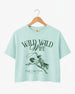 Gift idea for the bride: Wild Wild Wife cowgirl bachelorette crop top with vintage western art. Personalized with bride name, destination, and year for the whole crew.