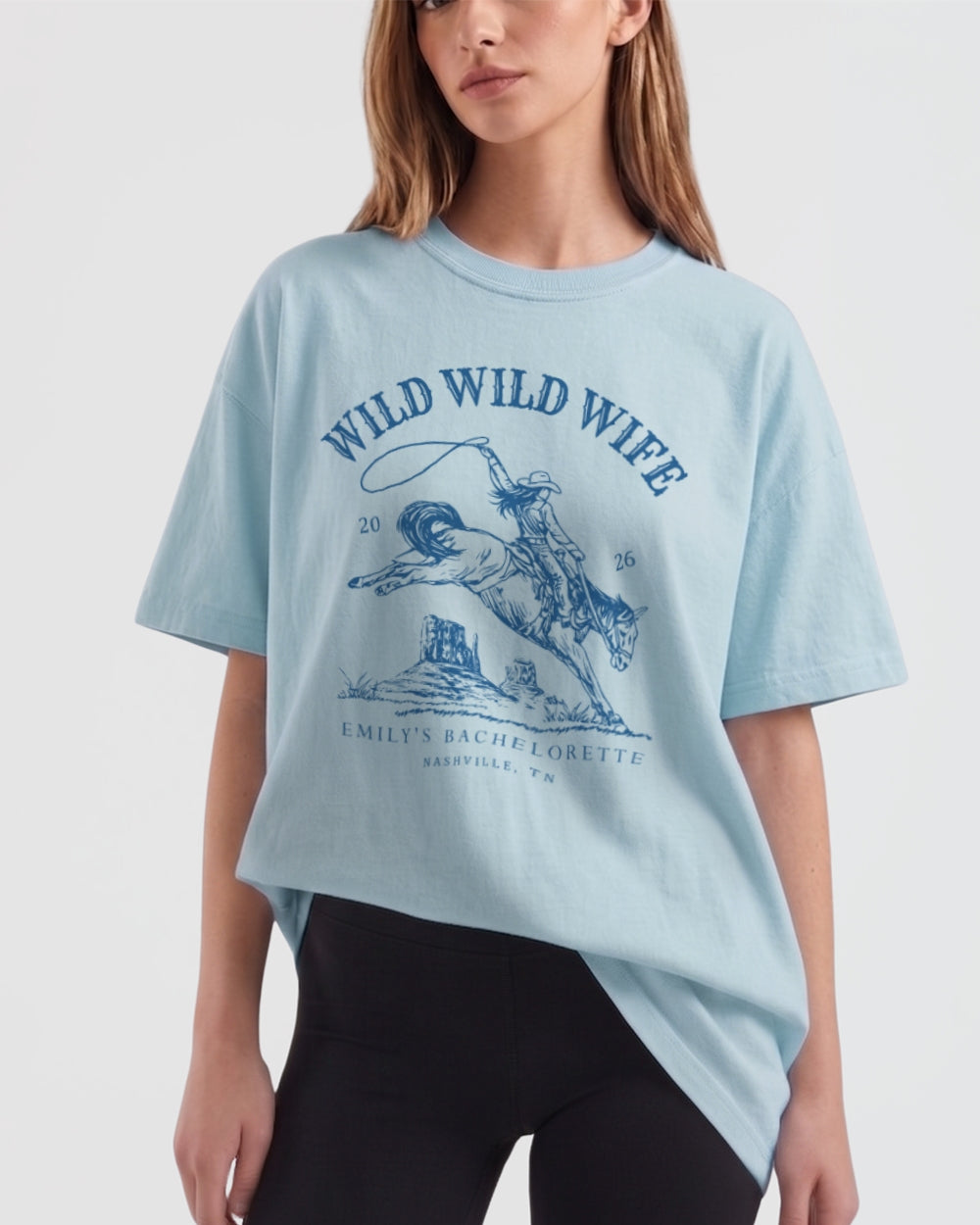 Bachelorette weekend rodeo tee with vintage western illustration for the Wild Wild Wife crew. Personalized with bride name, destination city, and weekend date for the whole party.
