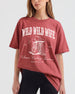 Personalized country bachelorette t-shirt with vintage western boot illustration and Wild Wild Wife theme. Custom bride name, wedding year, hometown, and city printed for the whole bridal crew.