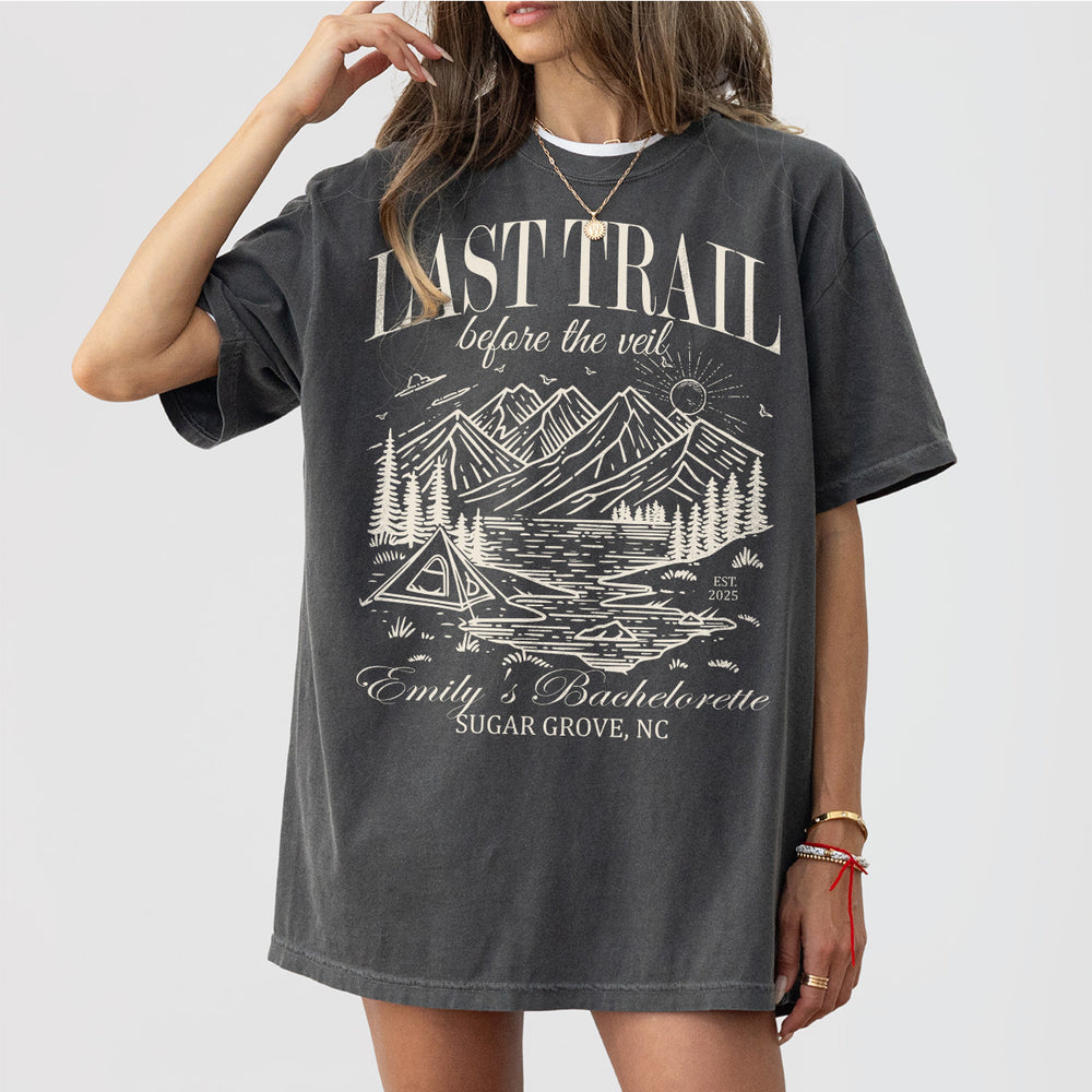 Pepper colored cotton shirts for bachelorette camping trip, featuring fun "Last Trail Before the Veil" bride-to-be design for outdoor adventures