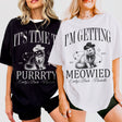 Custom cat themed bachelorette party shirts featuring a "Getting Meowied" design for the bride's cat loving bridal party