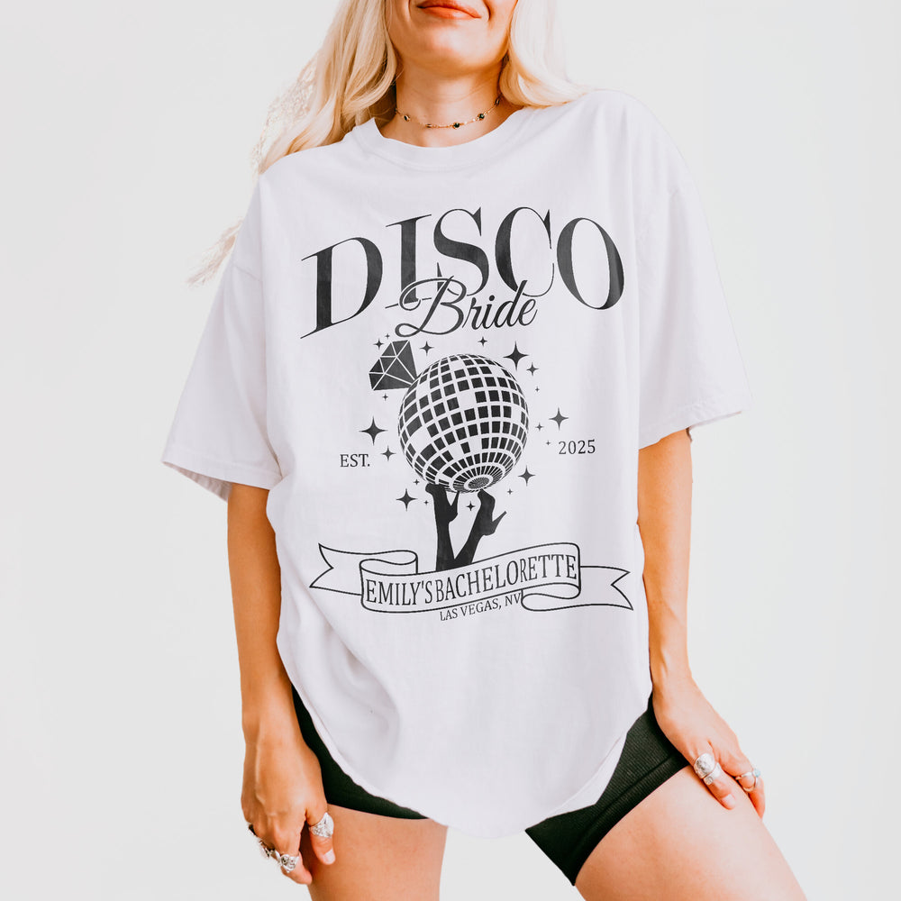 White cotton bachelorette party shirt with disco-themed graphics, perfect for the bride or bridesmaids to dance the night away