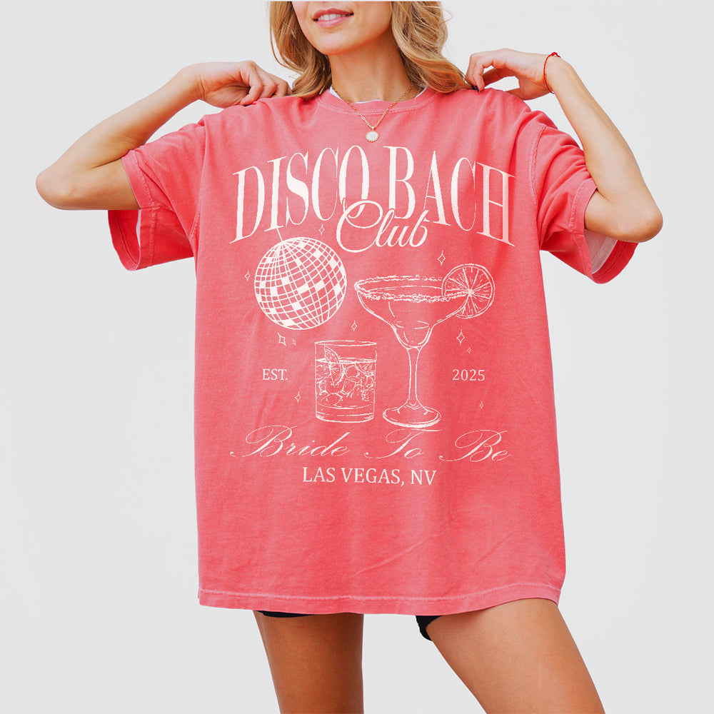 Cotton bachelorette party shirt in watermelon red featuring a retro disco theme for the bride-to-be and her squad on her last fling