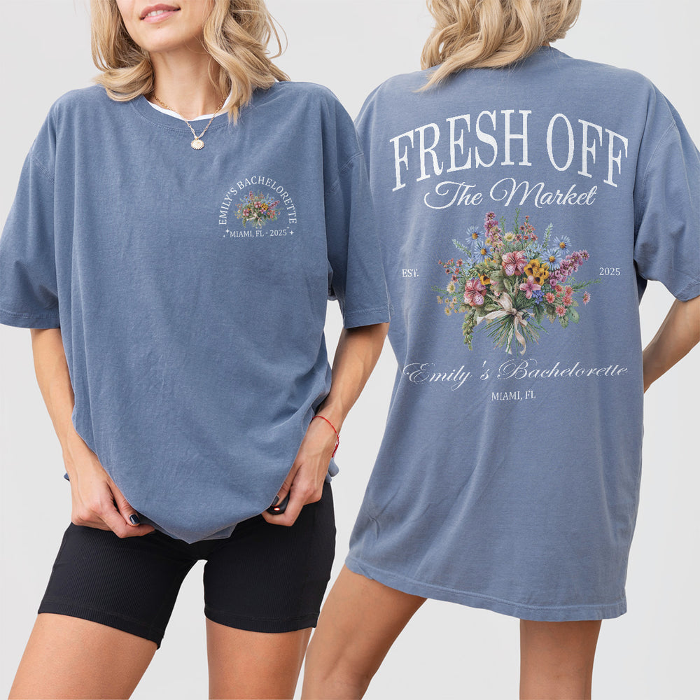 Cotton bride shirt in blue jean color with floral wildflower print, perfect for a fresh off the market personalized bachelorette party