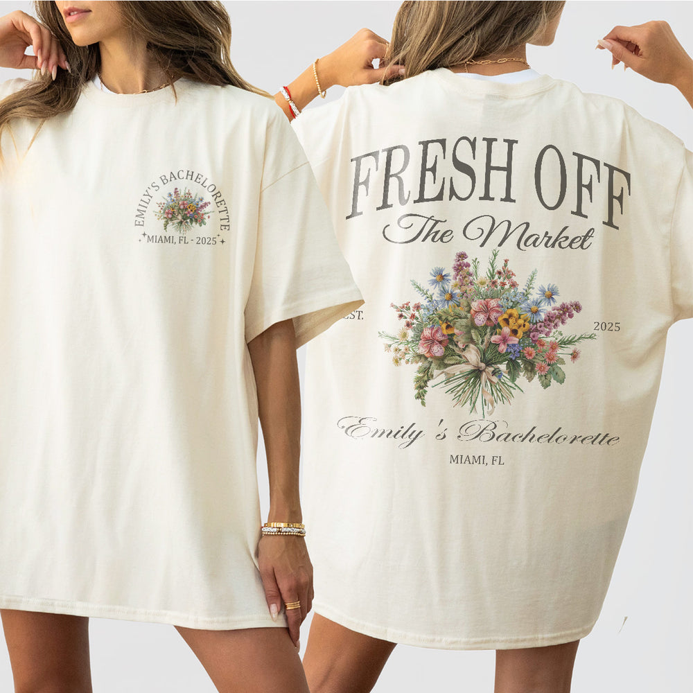 Ivory cotton bachelorette party shirt featuring a floral wildflower design, customized for the bride-to-be's fresh off the market celebration