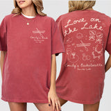 Crimson bachelorette shirt featuring a mountain lake design, perfect for a camping or outdoors themed lake bach party