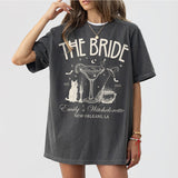 Pepper bridal shirt with witchy gothic design, perfect for a spooky Halloween bachelorette party or gothic wedding theme for the coven bride