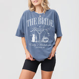 Soft blue denim shirt for a witchy, gothic bachelorette or bride featuring spooky Halloween and bridal party designs