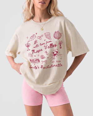 Gift idea for the Napa bachelorette crew: whimsical sketch-art tee personalized with bride name, year, and destination. A keepsake the whole wine-country party will want to keep wearing.