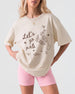 Girls night out t-shirt with vintage line-art design featuring boots and martinis. Let's Go Girls script lettering for bachelorette parties, girls trips, and weekend celebrations with the crew.