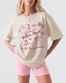 Bachelorette weekend tee with whimsical line-art doodles and script typography, customizable with bride name, destination city, and EST year for the whole crew.