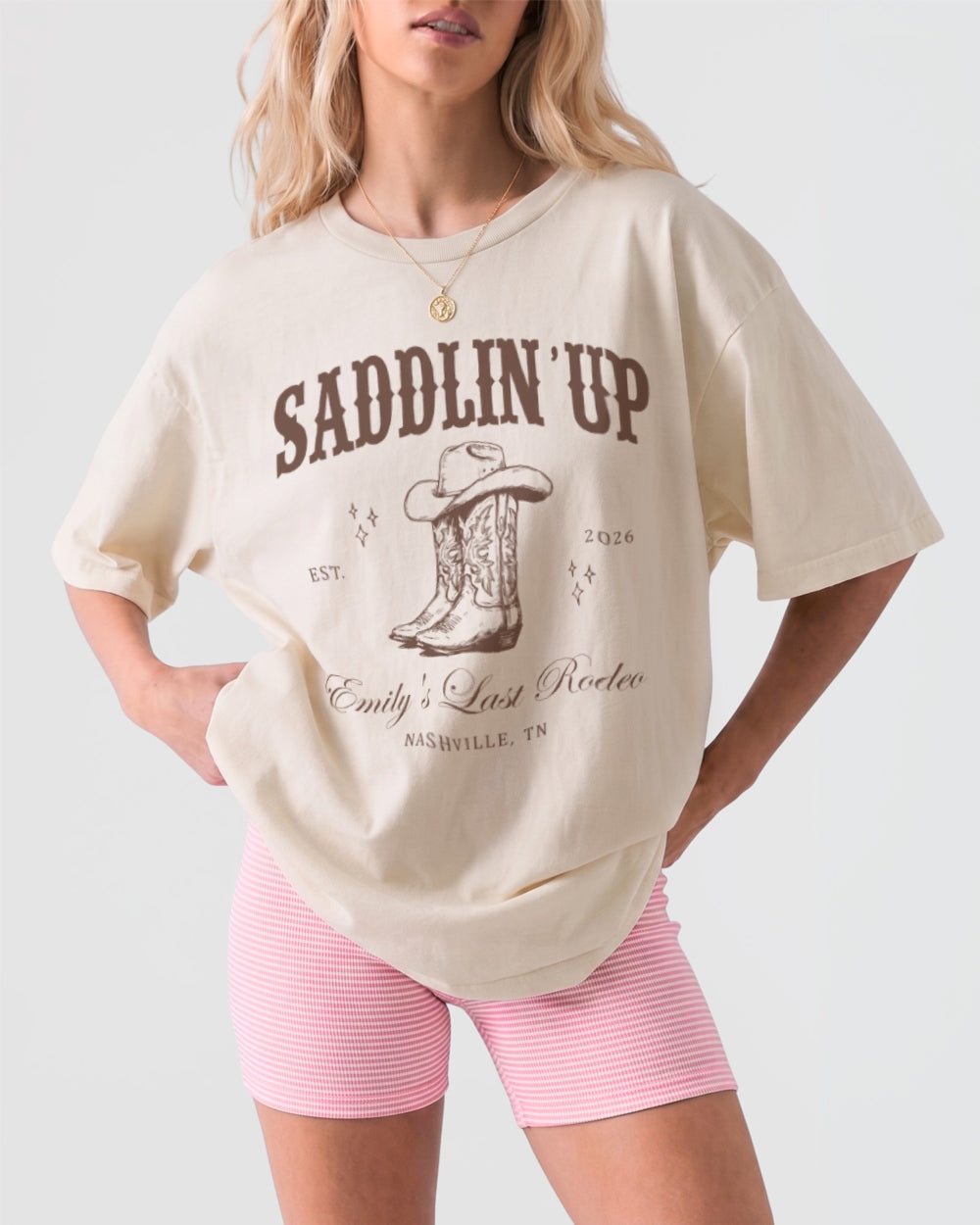 Bachelorette weekend western tee for the bride's last rodeo crew. Vintage cowboy boot illustration with bride name, year, and city customizable for any Nashville or country destination party.