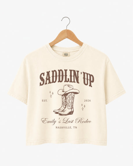 Bachelorette rodeo weekend crop top for the Last Rodeo bride and her crew. Vintage western style with bride name, year, and city customizable for any destination.