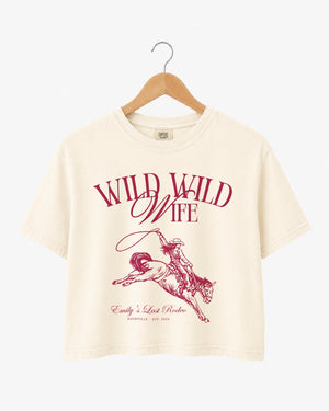 Bachelorette weekend crop top with vintage western illustration and script typography. Last rodeo theme for the bride and her crew, with bride name, date, and city customizable.